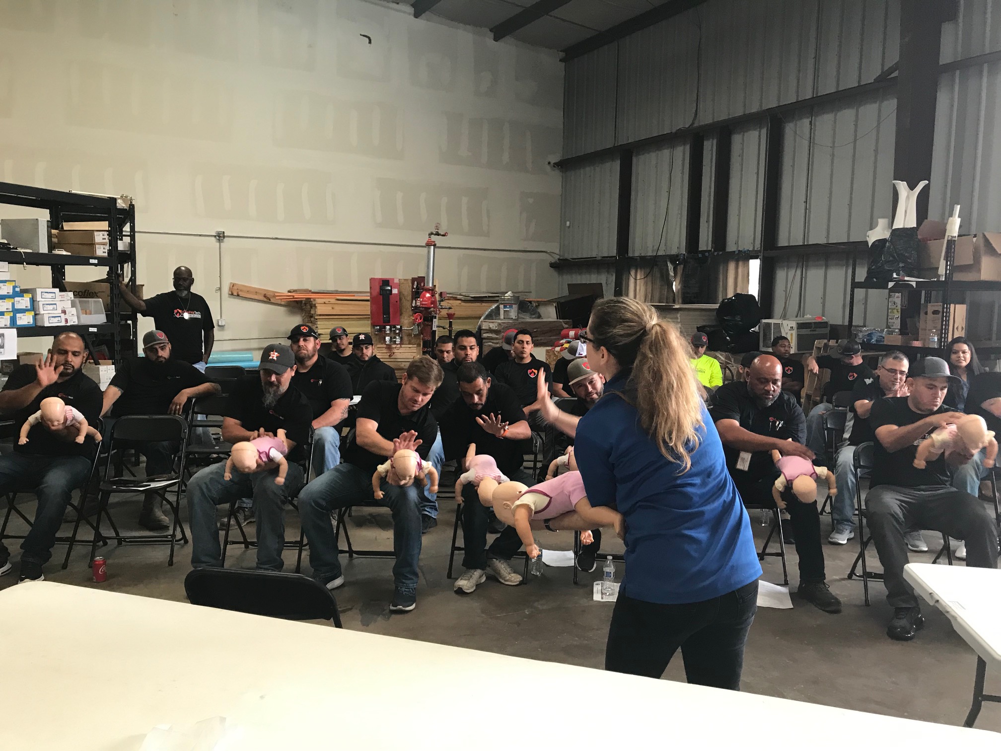 Image of a class full of people learning CPR training in Houston, Texas.